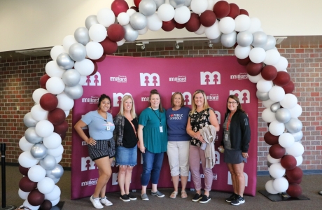 staff posing for photo