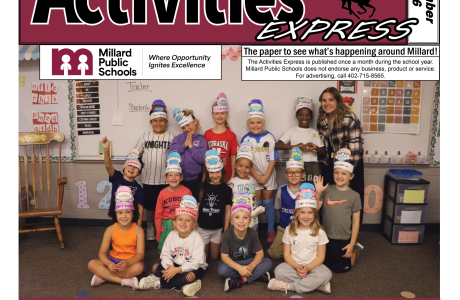 Cover page of the paper with a class picture of students wearing doctor hats.