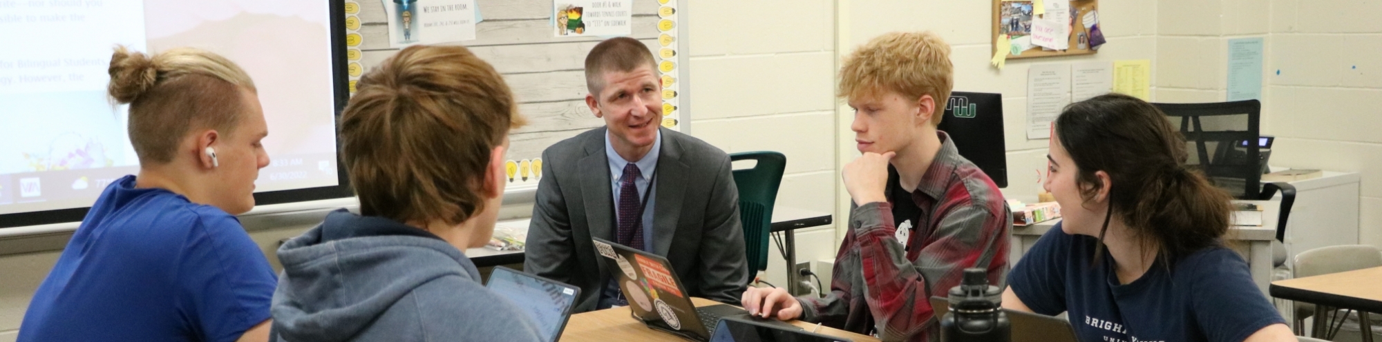 Dr. Schwartz talking with high school students