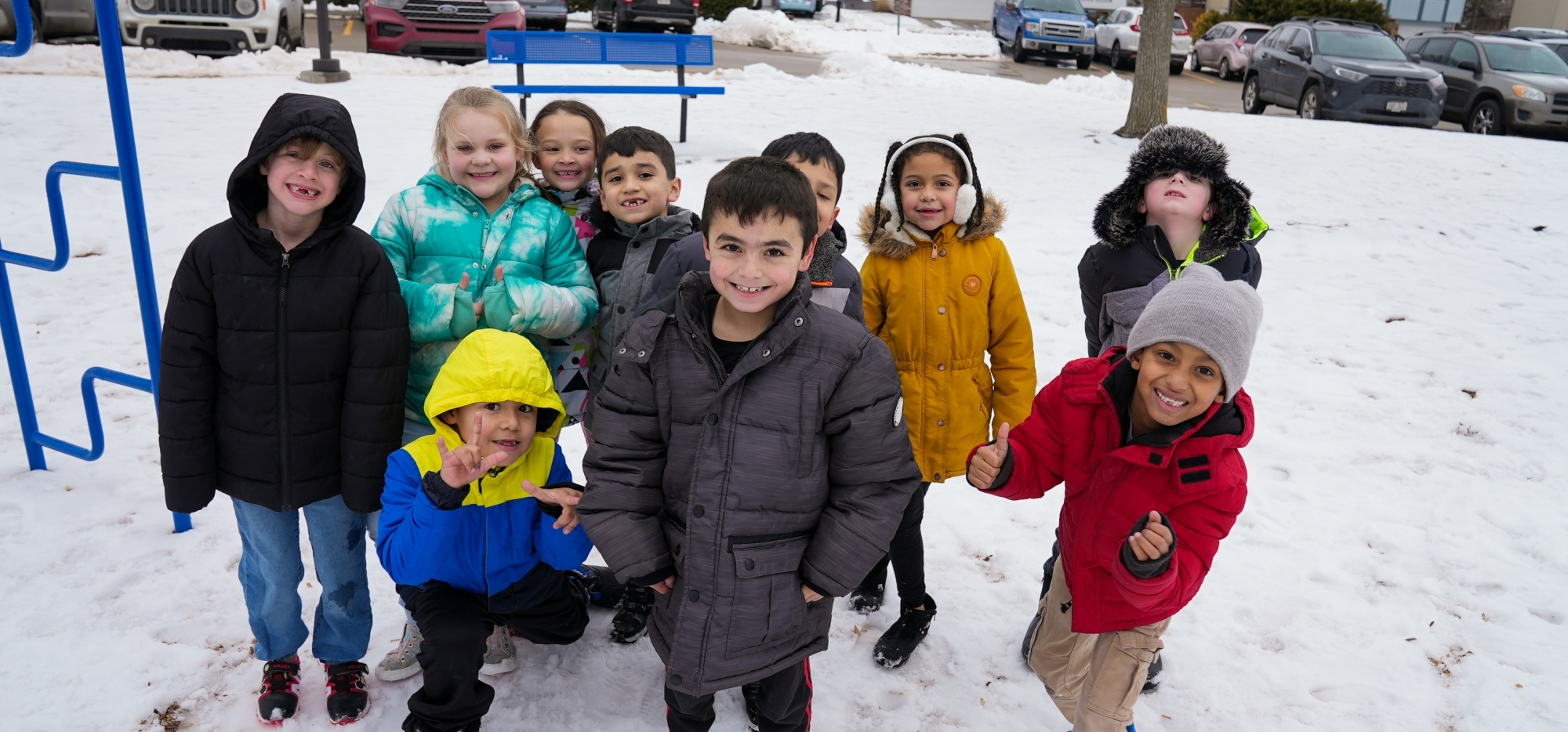 kids smiling on winter playground